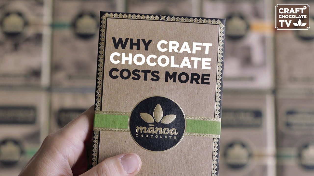 Image of hands holding a chocolate bar with text reading "Why Craft Chocolate Costs More". 