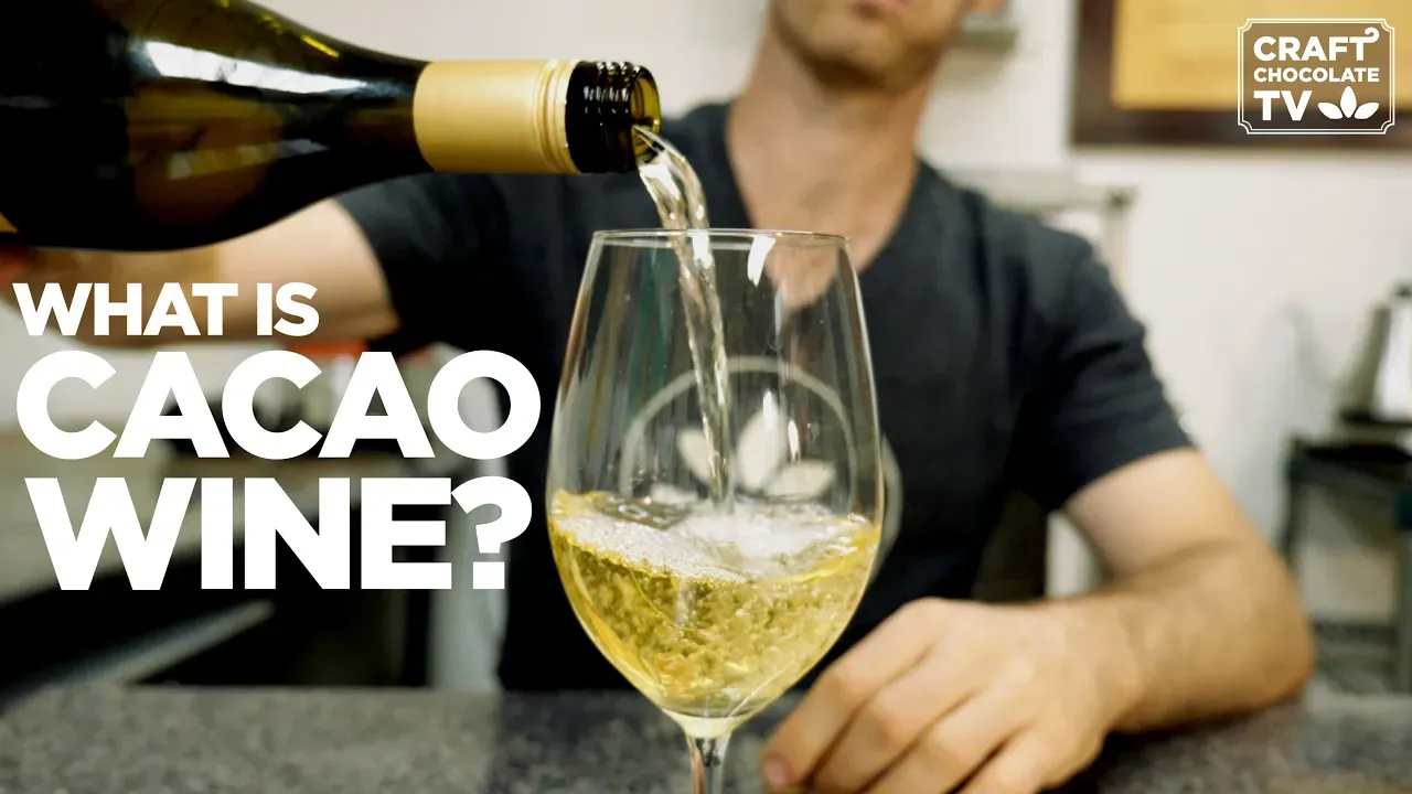 Image of of a person pouring cacao wine in a glass with text reading "What Is Cacao Wine?". 