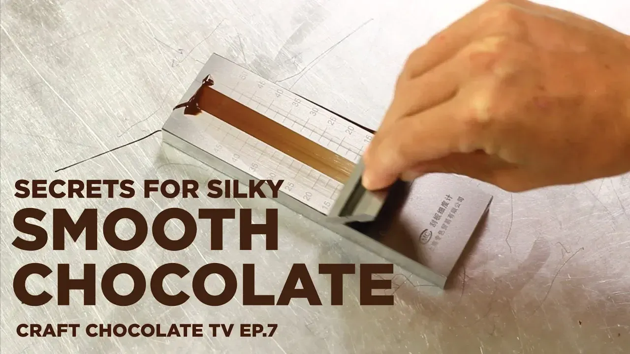 image of hand testing chocolate on a grindometer with text reading "Secrets for Silky Smooth Chocolate - Craft Chocolate TV ep7"