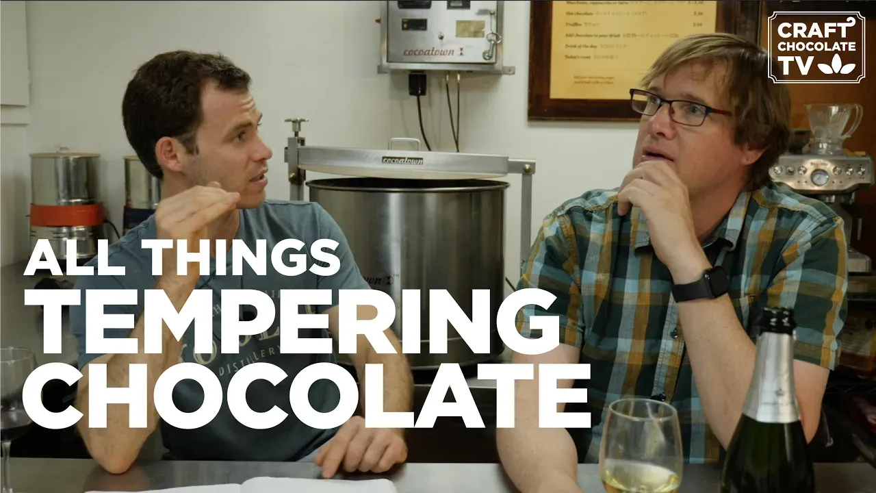 Image of two men talking with text reading "All Things Tempering Chocolate".
