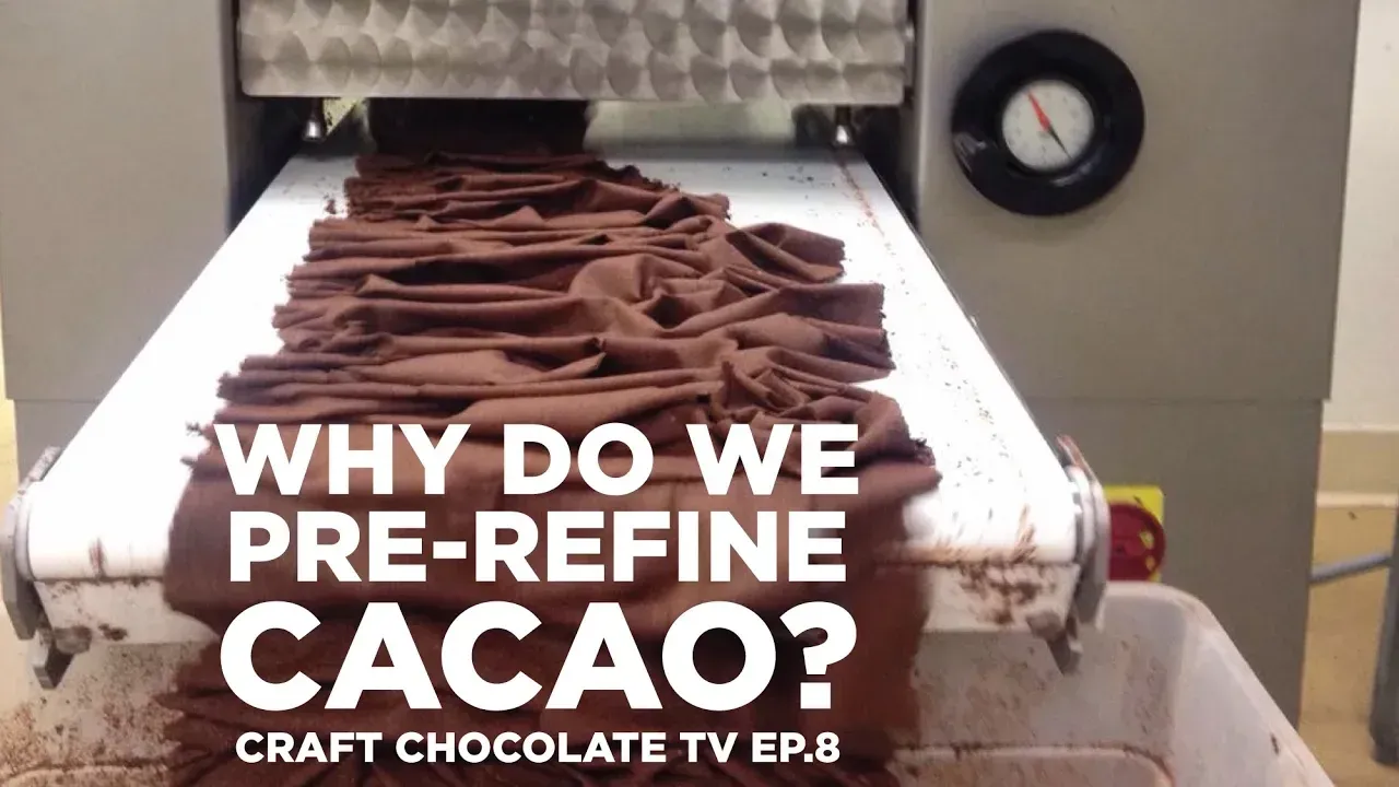 image of ribons of chocolate on a pre-refiner with text reading "Why Do We Pre-Refine Cacao? - Craft Chocolate TV ep8"