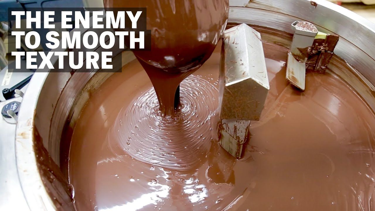 Image of chocolate conch with text reading "The Enemy To Smooth Texture". 