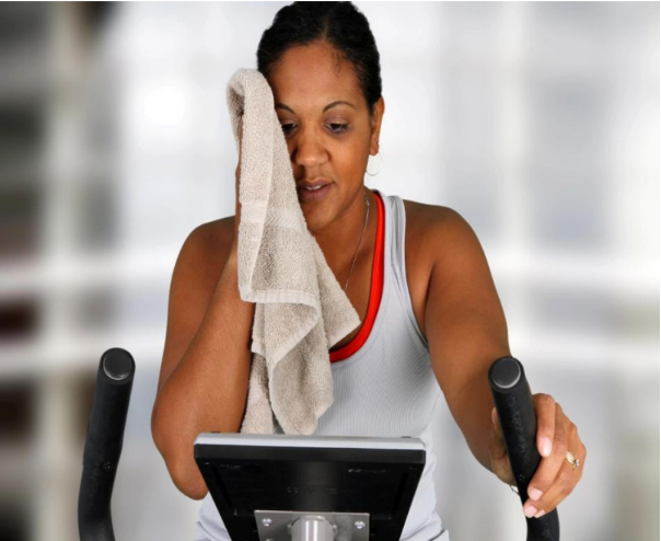 Woman exercising on bike