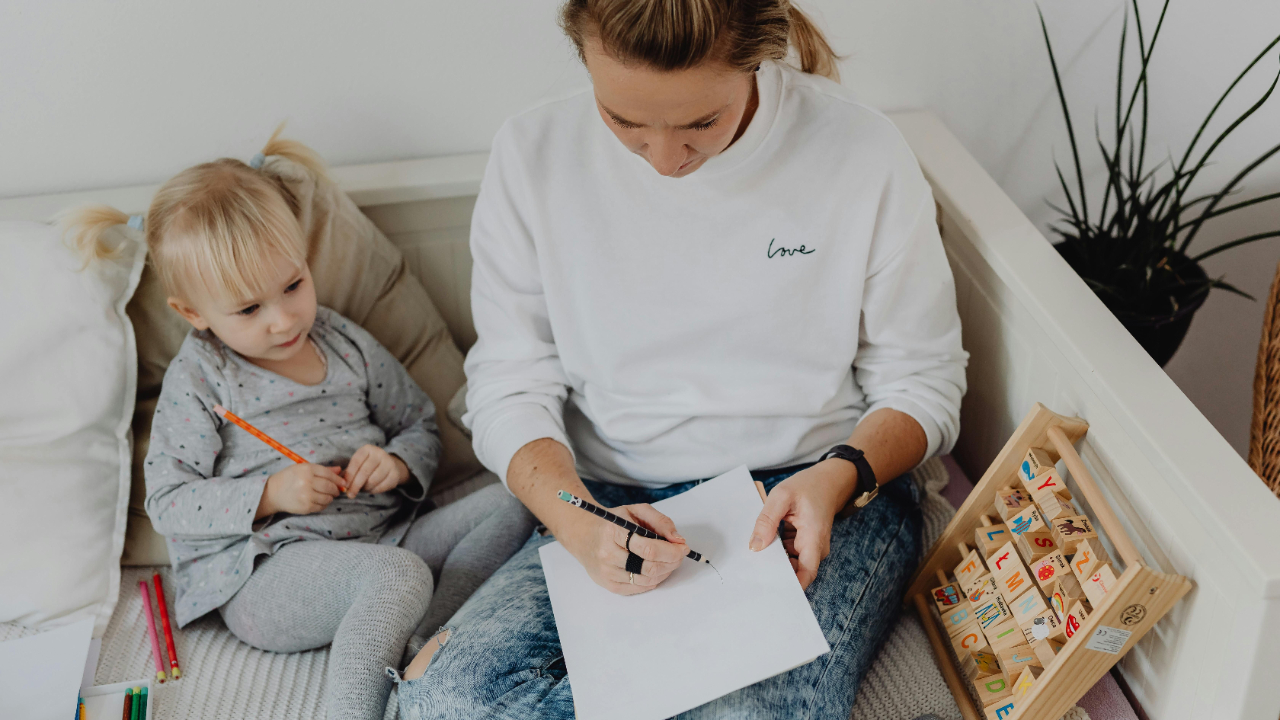 Mother-and-child-sitting-and-drawing-together