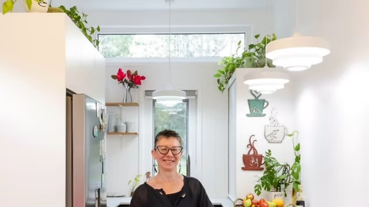 Wendy in her colourful Tiny Home on the Sunshine Coast in QLD.