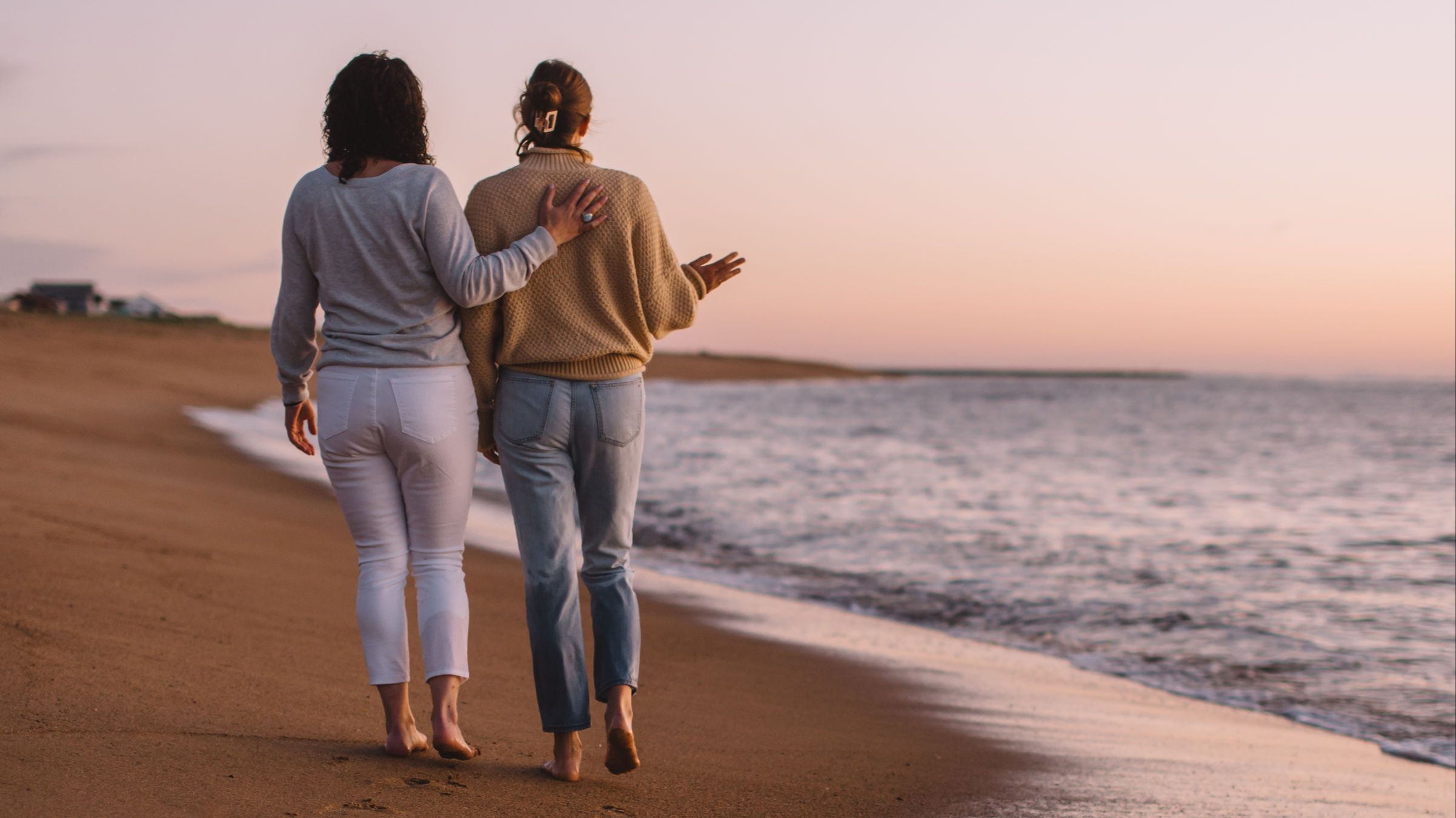 sea glass in hands on a beach