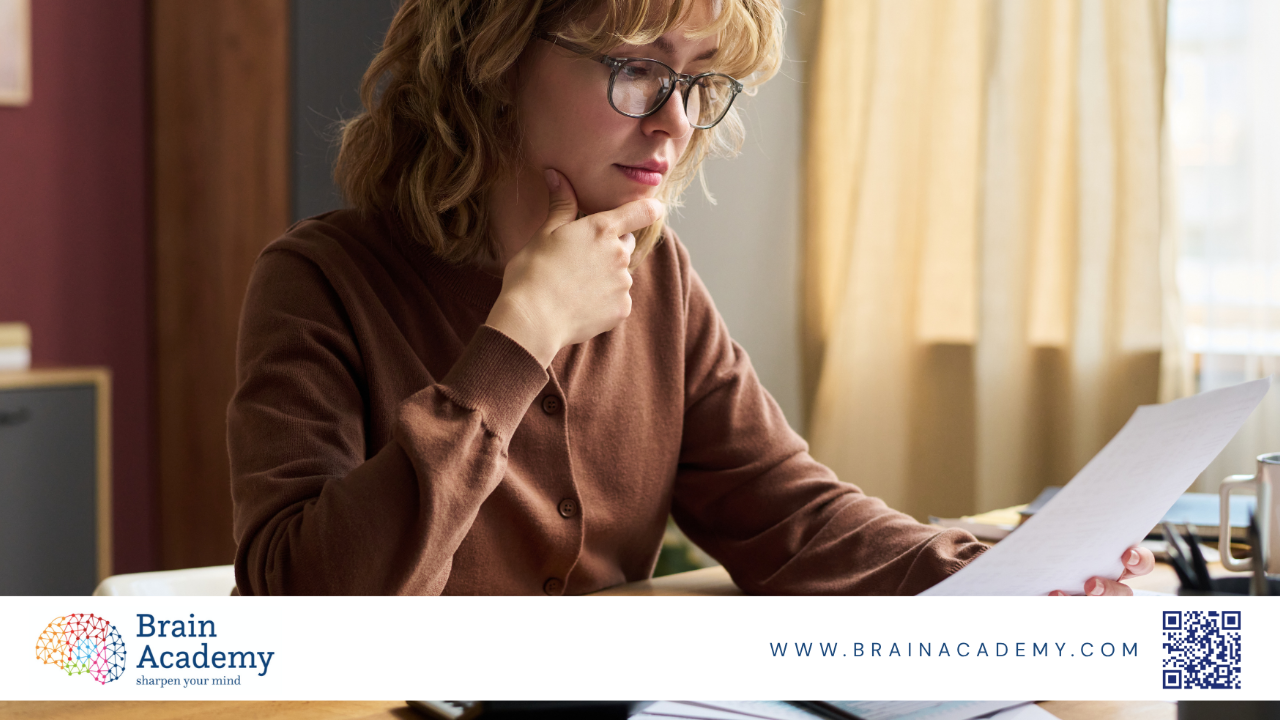 lady looking at a paper checking neuroscience programs