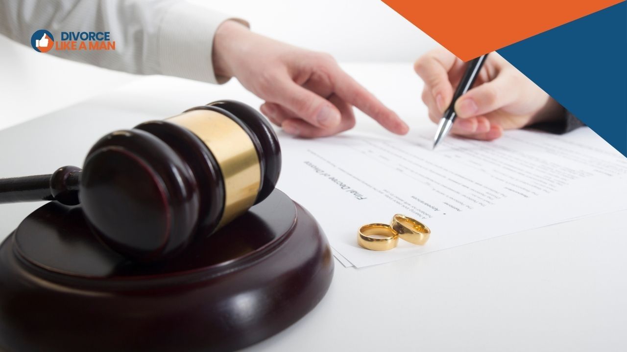 Man in a consultation with a divorce lawyer taking notes