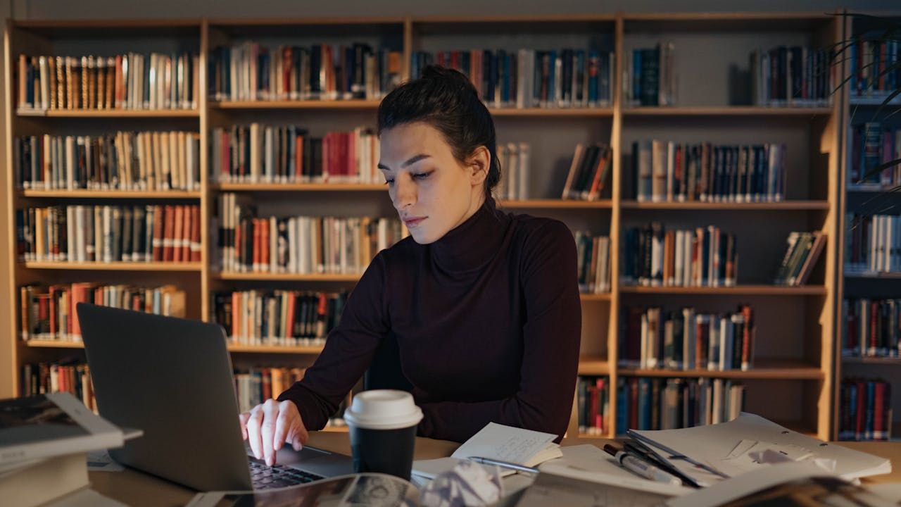 woman engaging in a focused online therapy session from her home