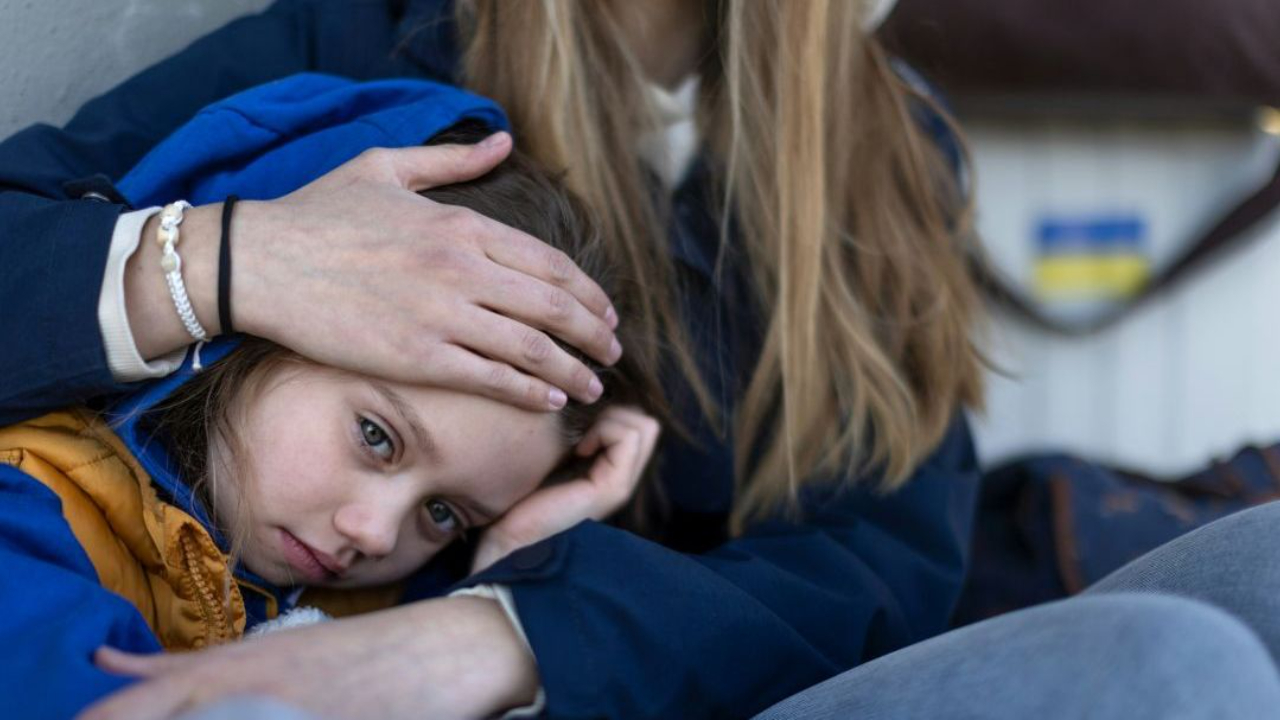 Child afraid with Mom