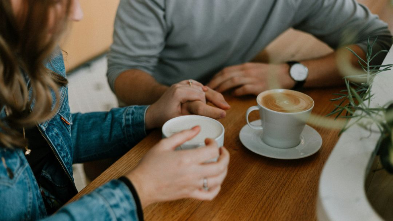 two people having coffee and support