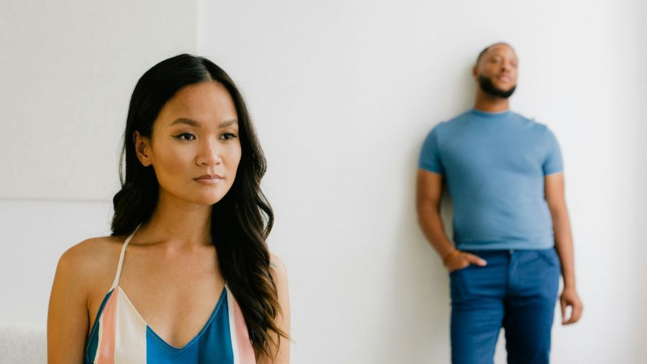 Couple standing distanced