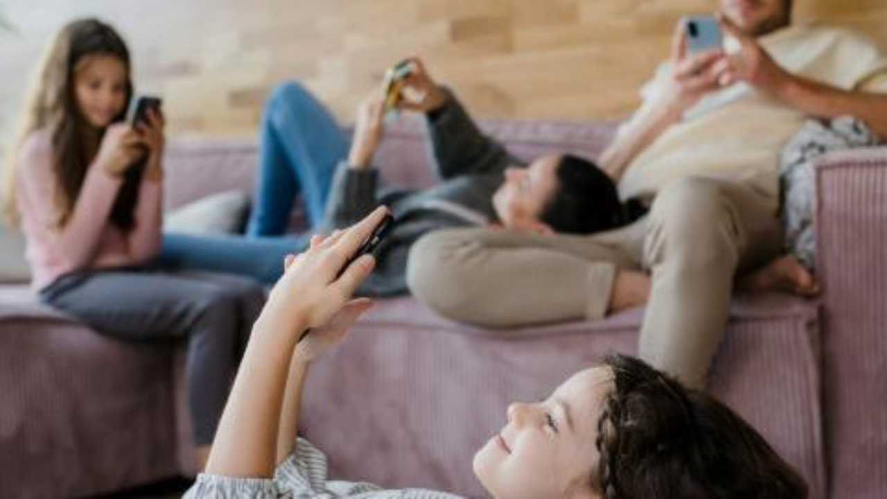 family all on their phones
