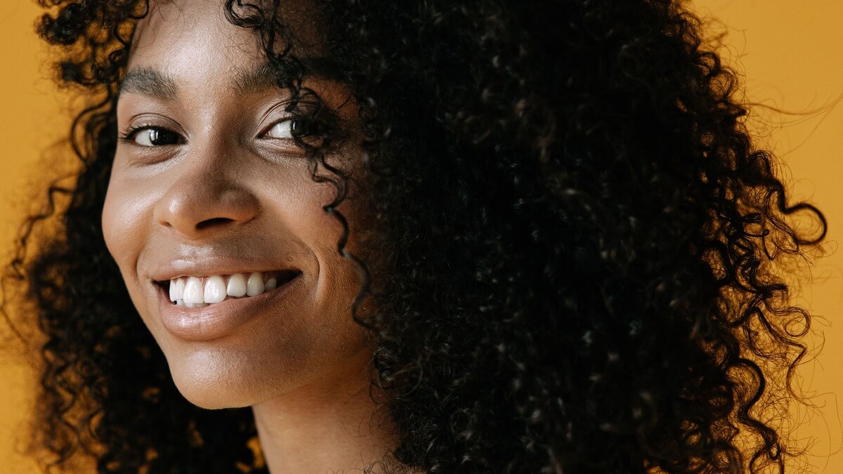 a woman smiling at the camera
