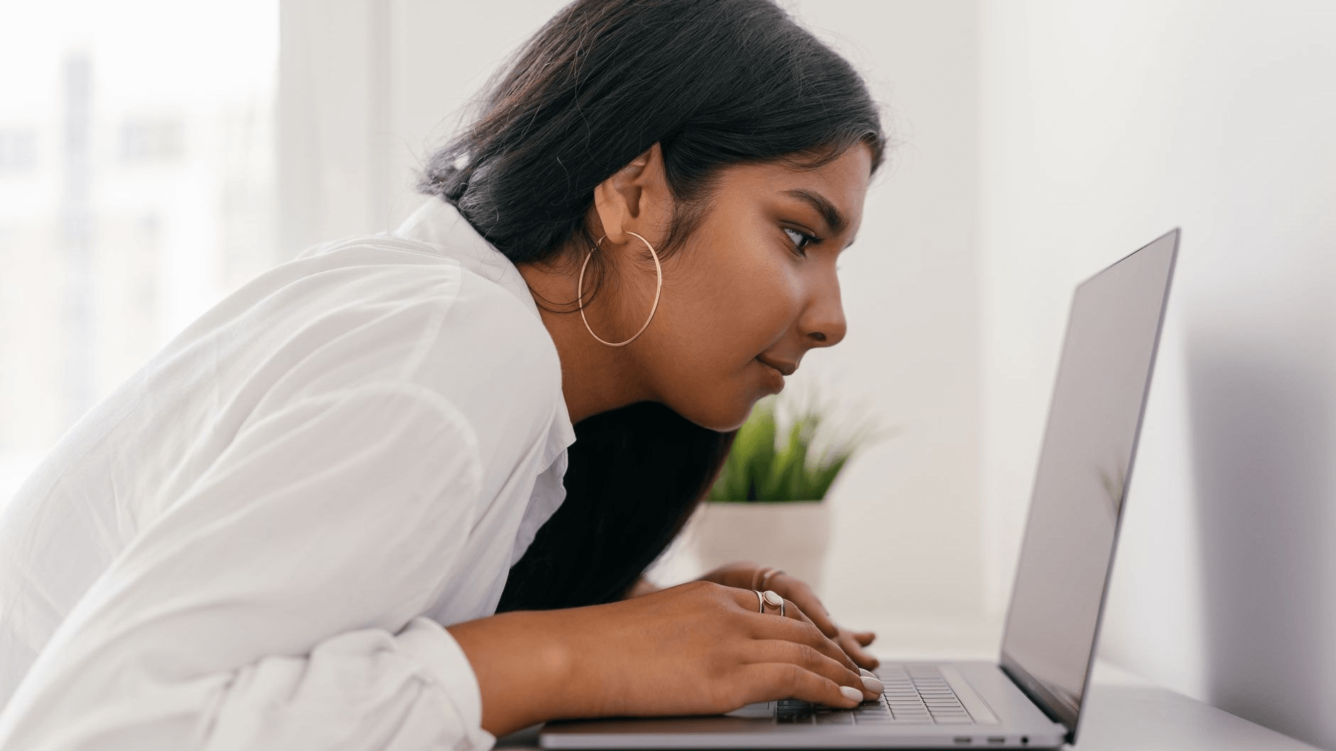 a woman doing a self-paced online course