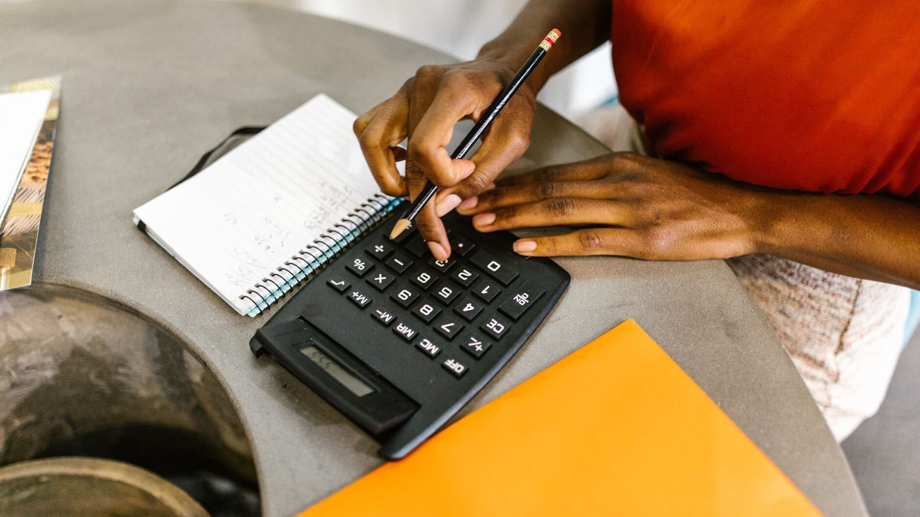 someone using a calculator