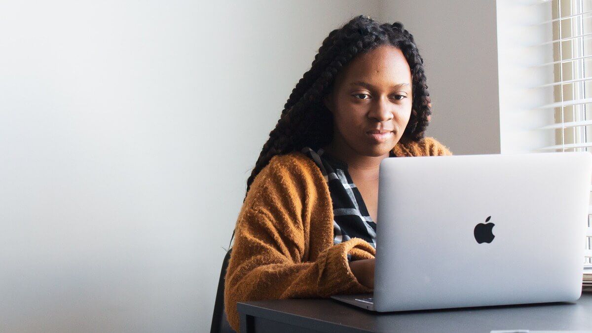 a woman working on her laptop