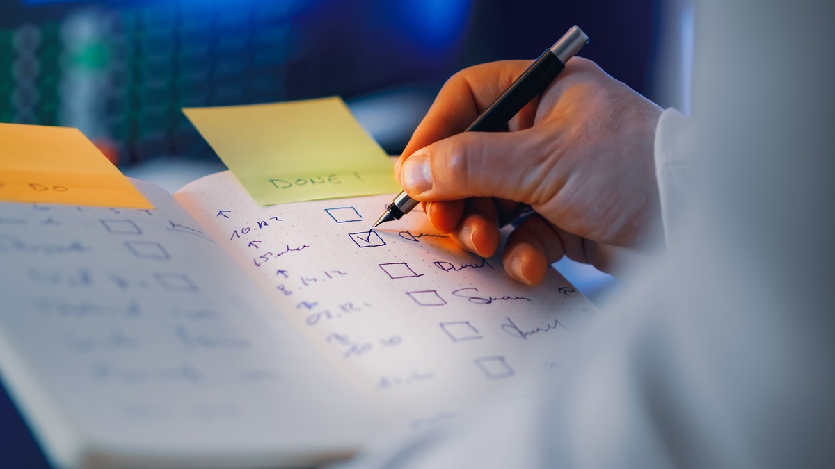 Handwritten checklist used to track money mindset progress over 30, 60, and 90 days