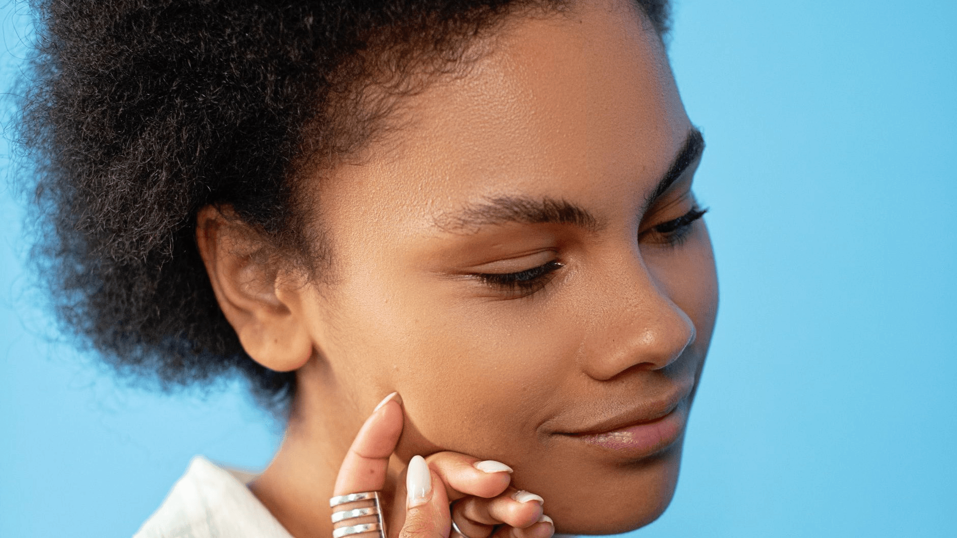 a woman showing signs of natural flirting style blockage
