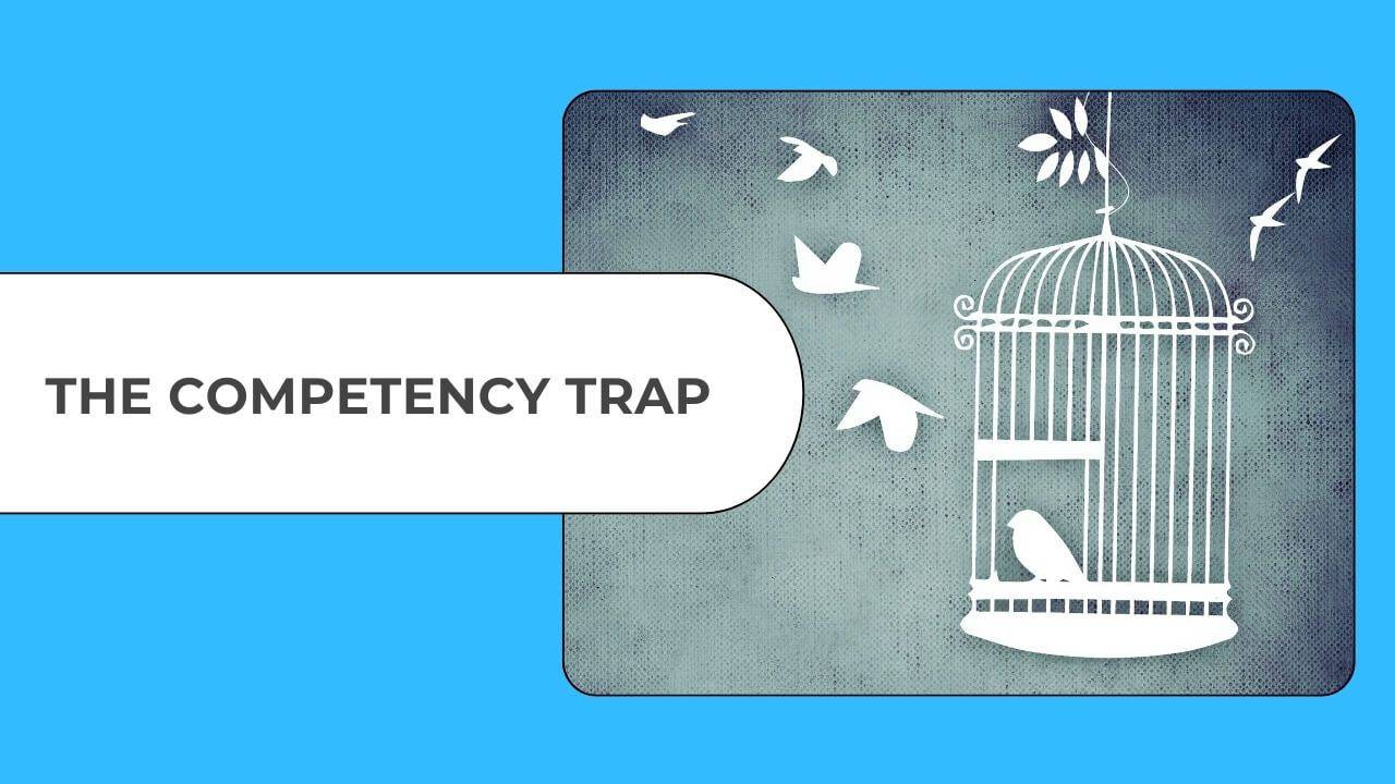 Bird in a cage with other birds flying free symbolising the competency trap and being confined by your strengths