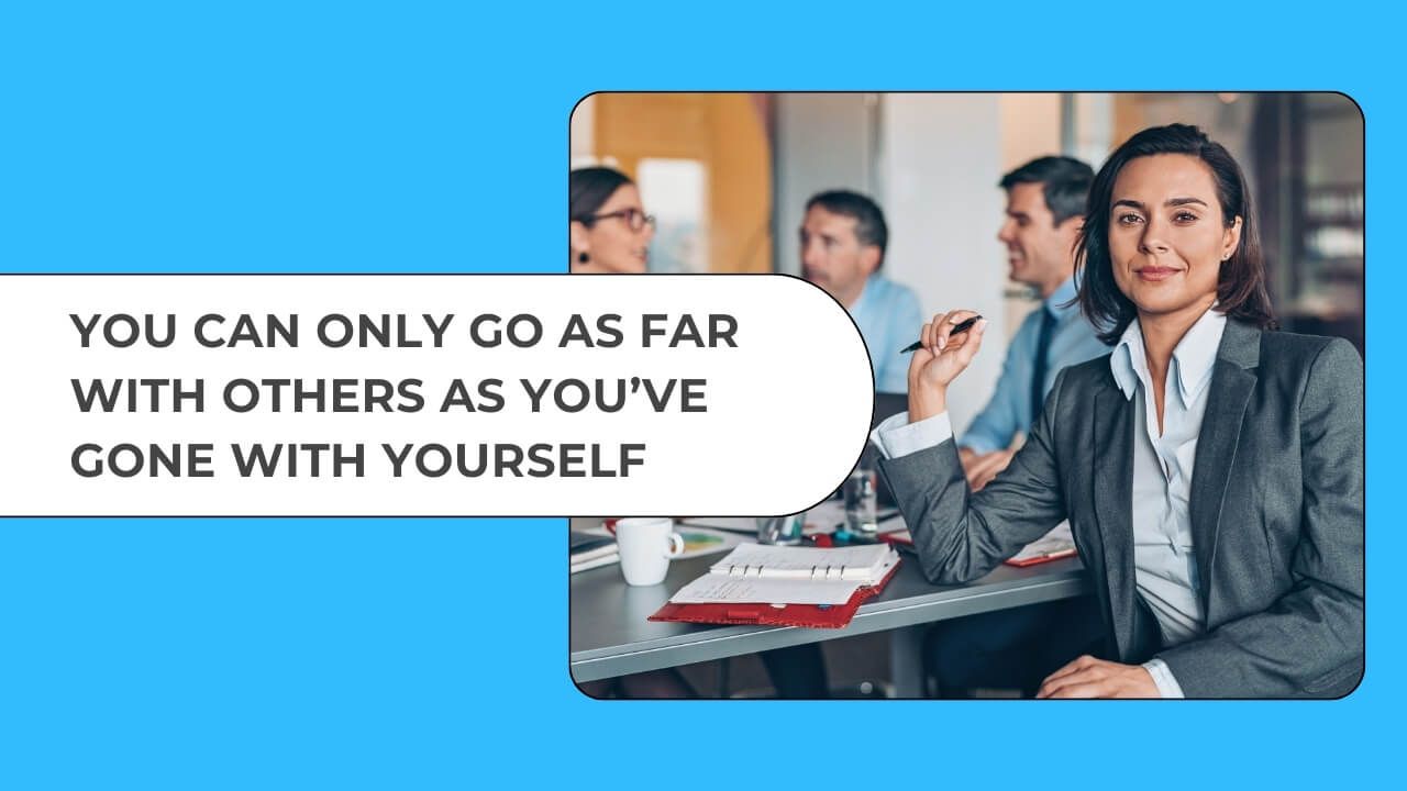 Professional woman in team meeting representing leadership presence and self-awareness