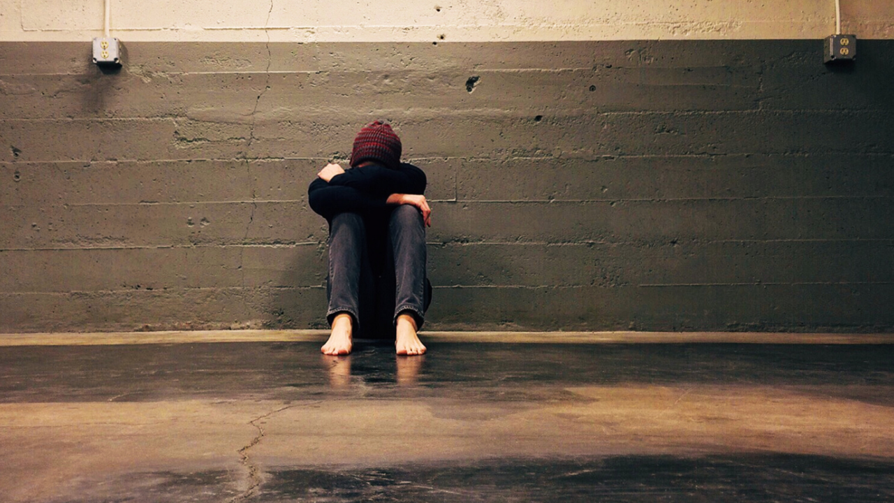 Frustrated Parent Taking a Break – A parent stepping away to manage their emotions before continuing a conversation with their teen.