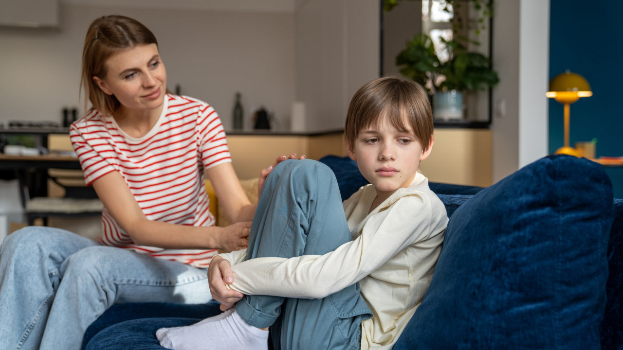 Parent and child sitting together:
