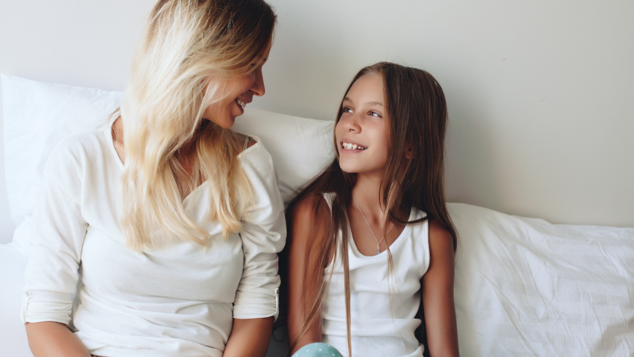 Parent and Teen Having a Meaningful Conversation – A supportive discussion that fosters trust and connection