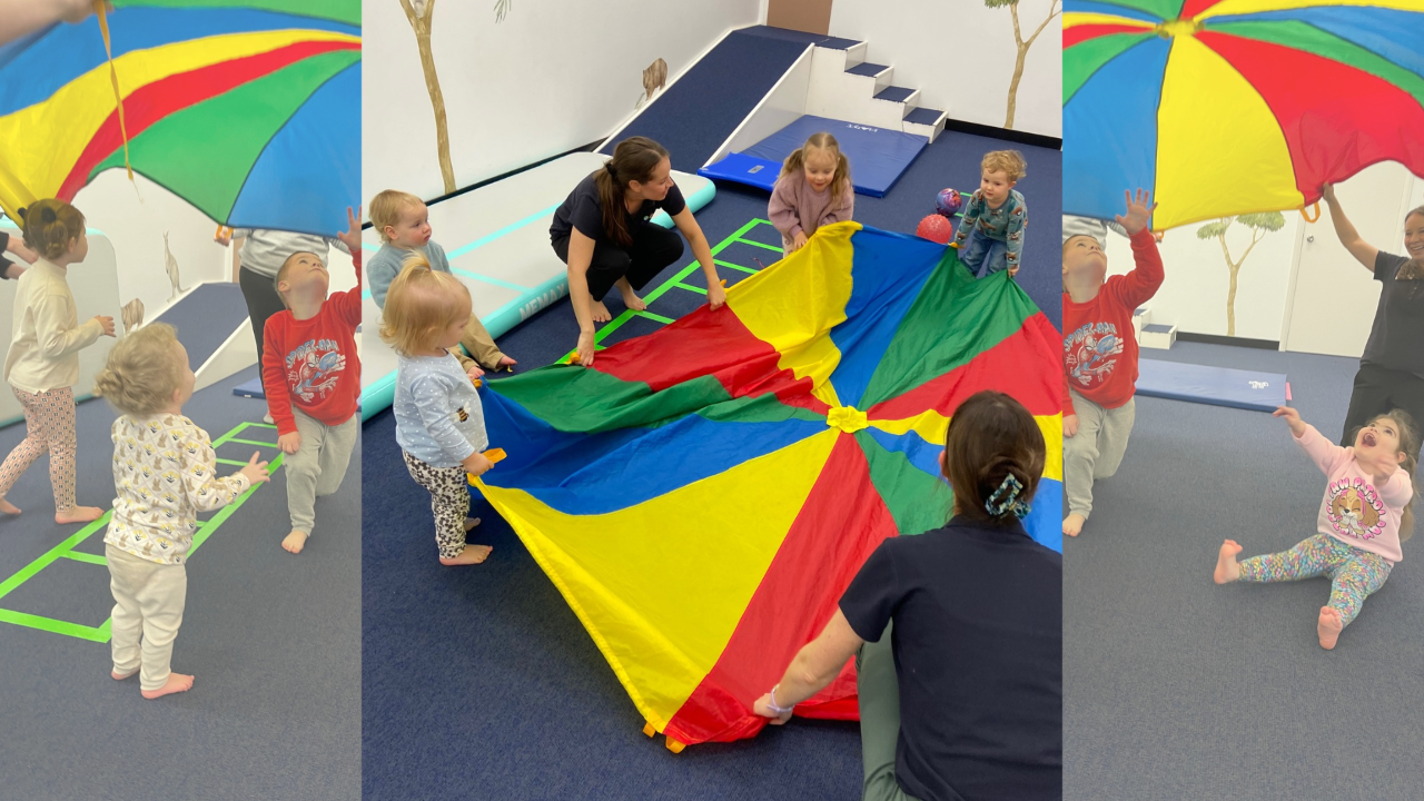 Children exploring and playing together during toddler playgroup.
