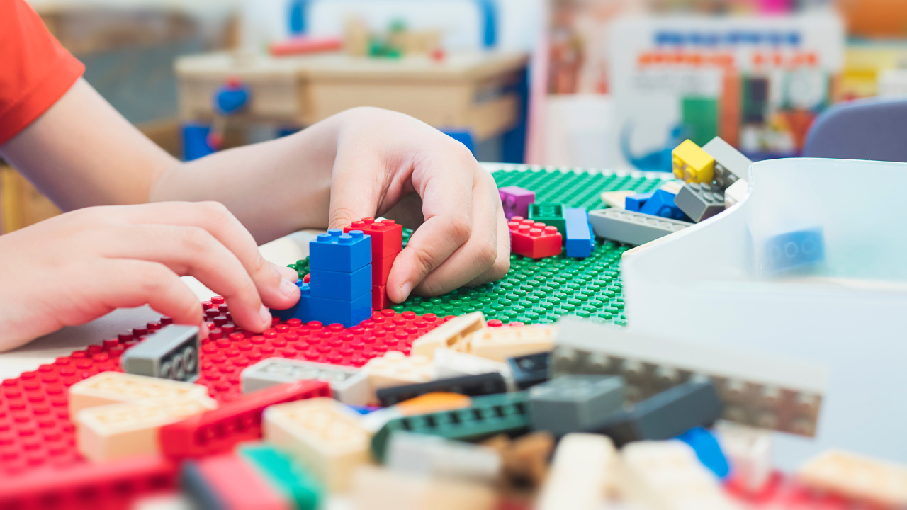 Paediatric psychology session using blocks to support child engagement.
