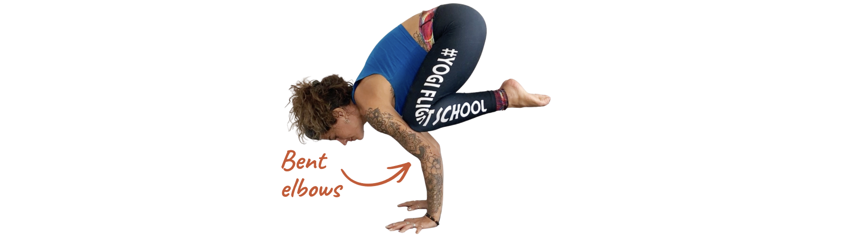 Crow Pose with knees resting high on the upper arms