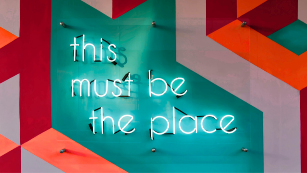 Graphic showing a neon sign with 