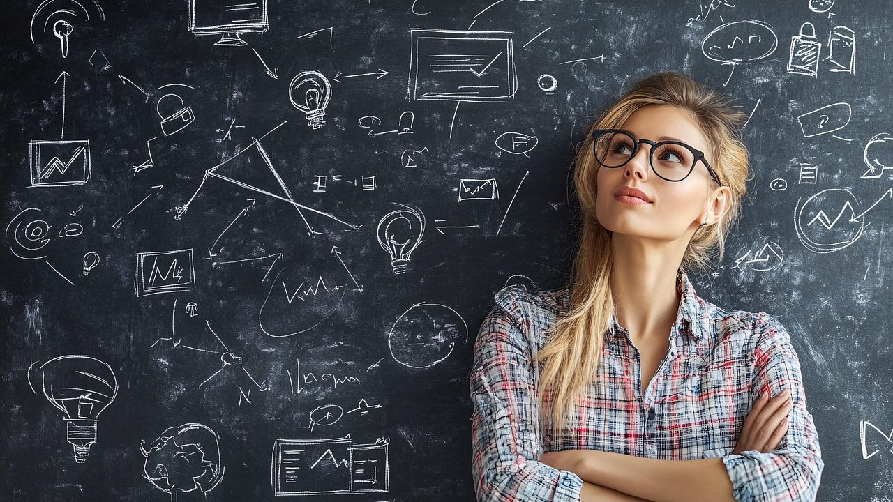 Woman looking wistful in front of chalkbard full of equations