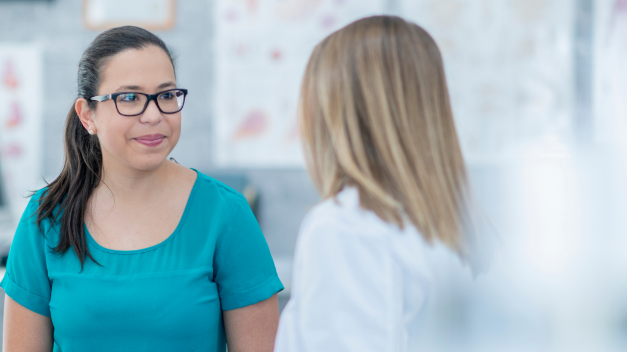 women talking to their doctor