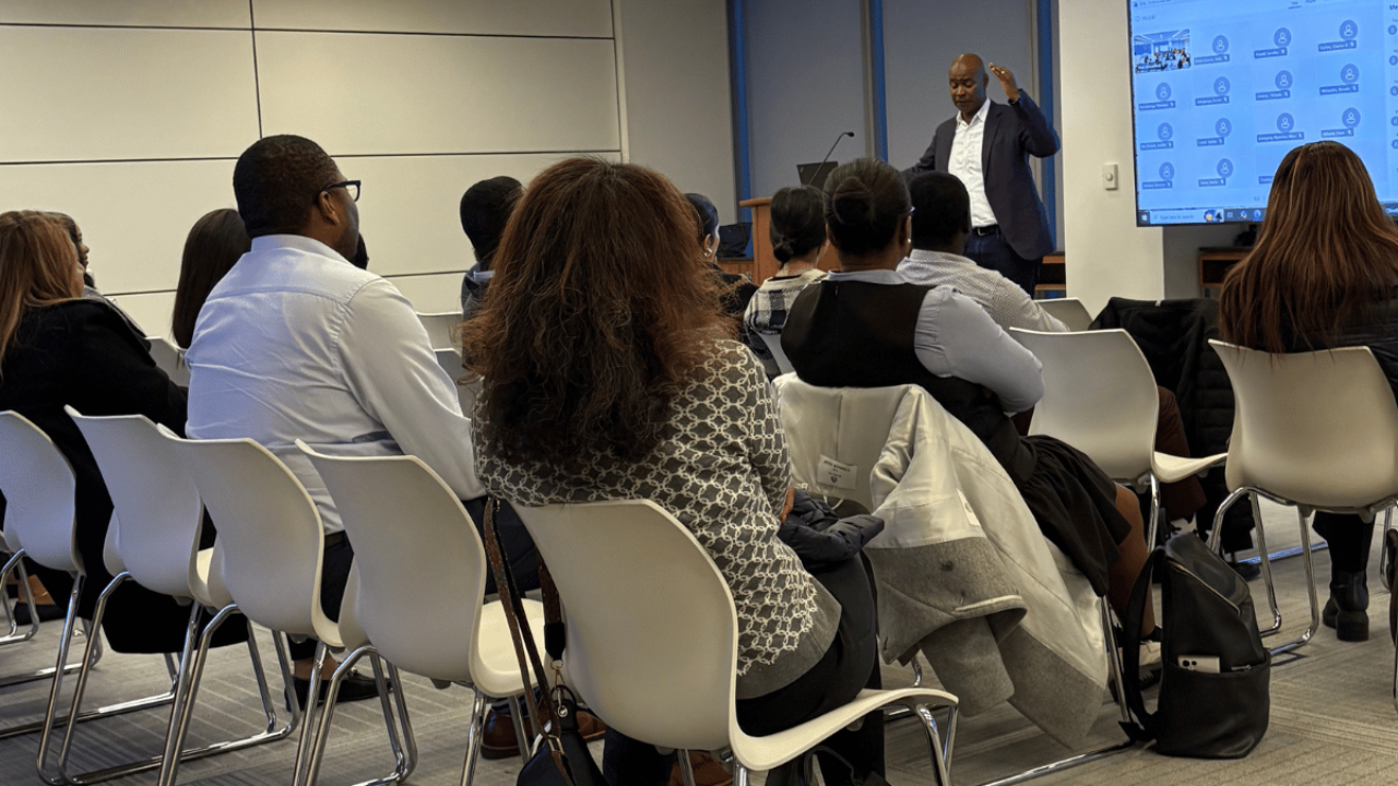 Ivan speaking to a Hybrid audience at a Big Four firm downtown Toronto