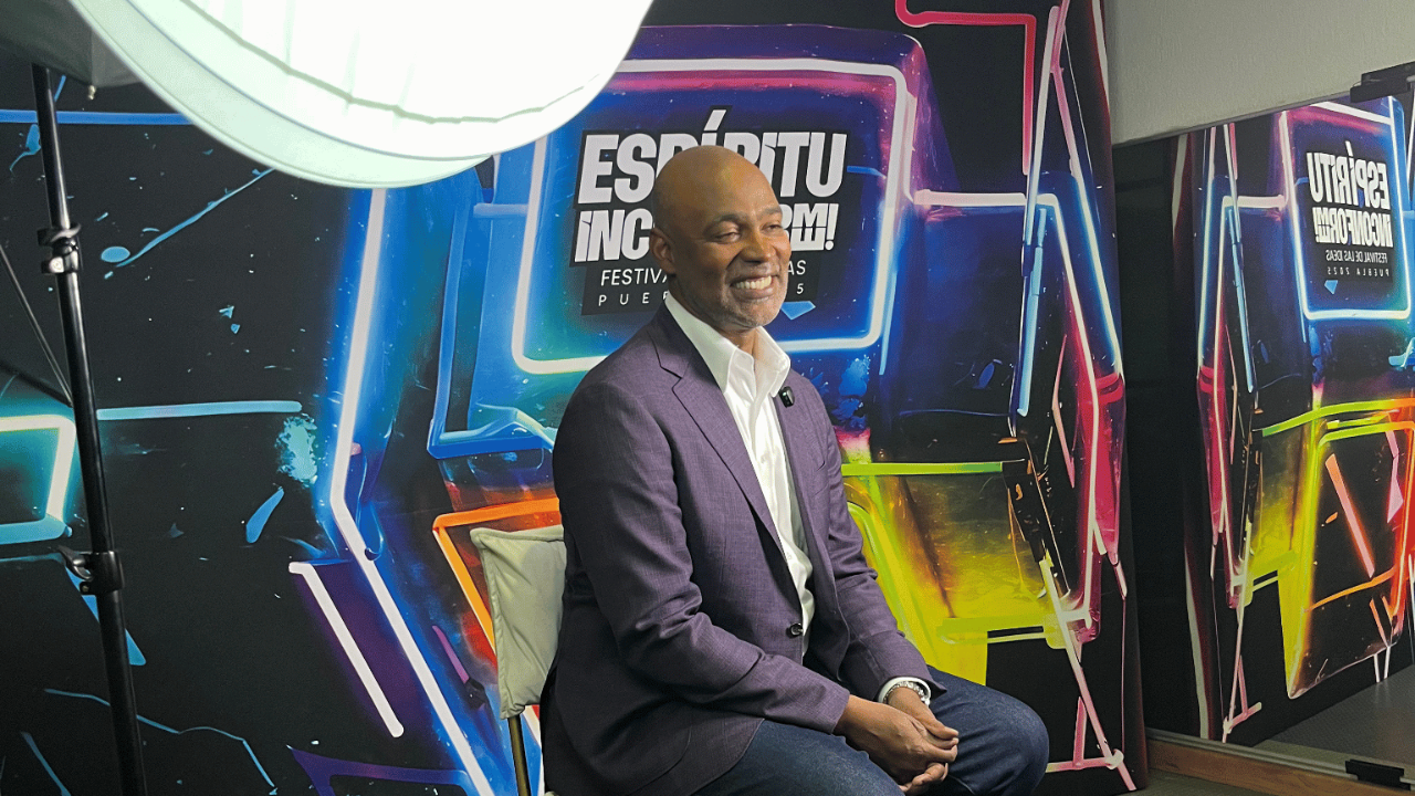 Ivan sitting for a television interview while speaking to a symposium in Mexico