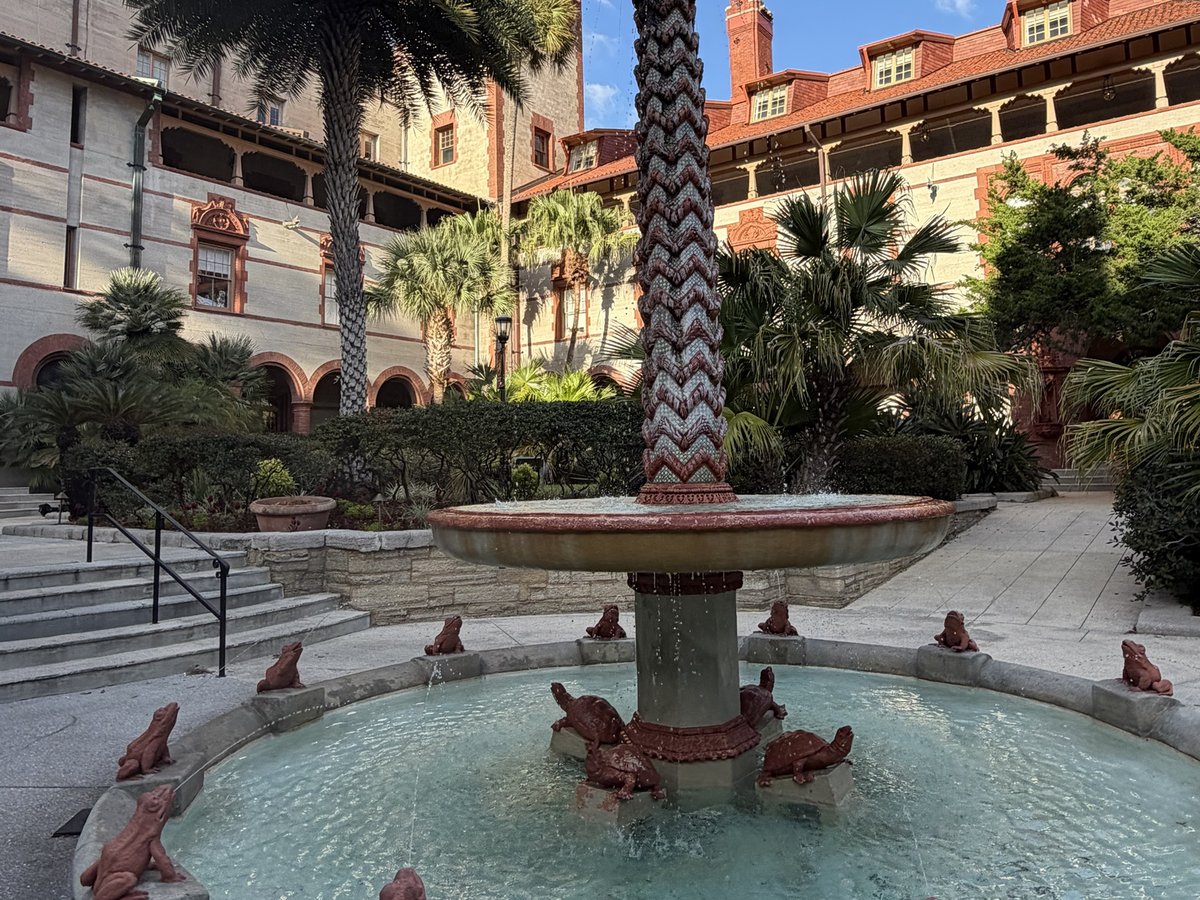 Frog fountain in the Flagler College courtyard with the towers behind it