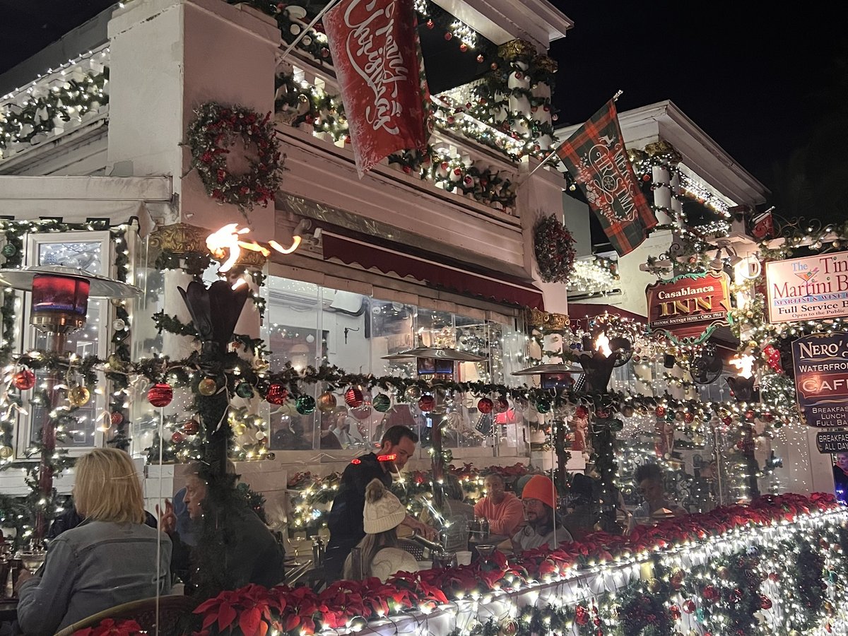 Casablanca Inn decorated with poinsettias and lights for Nights of Lights