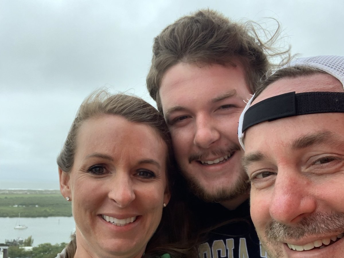 Windy family selfie at the top of the St. Augustine Lighthouse