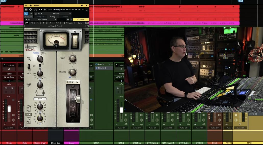 Waves REDD.37&ndash;51 tone, gain, drive, and output controls beside David at his console.