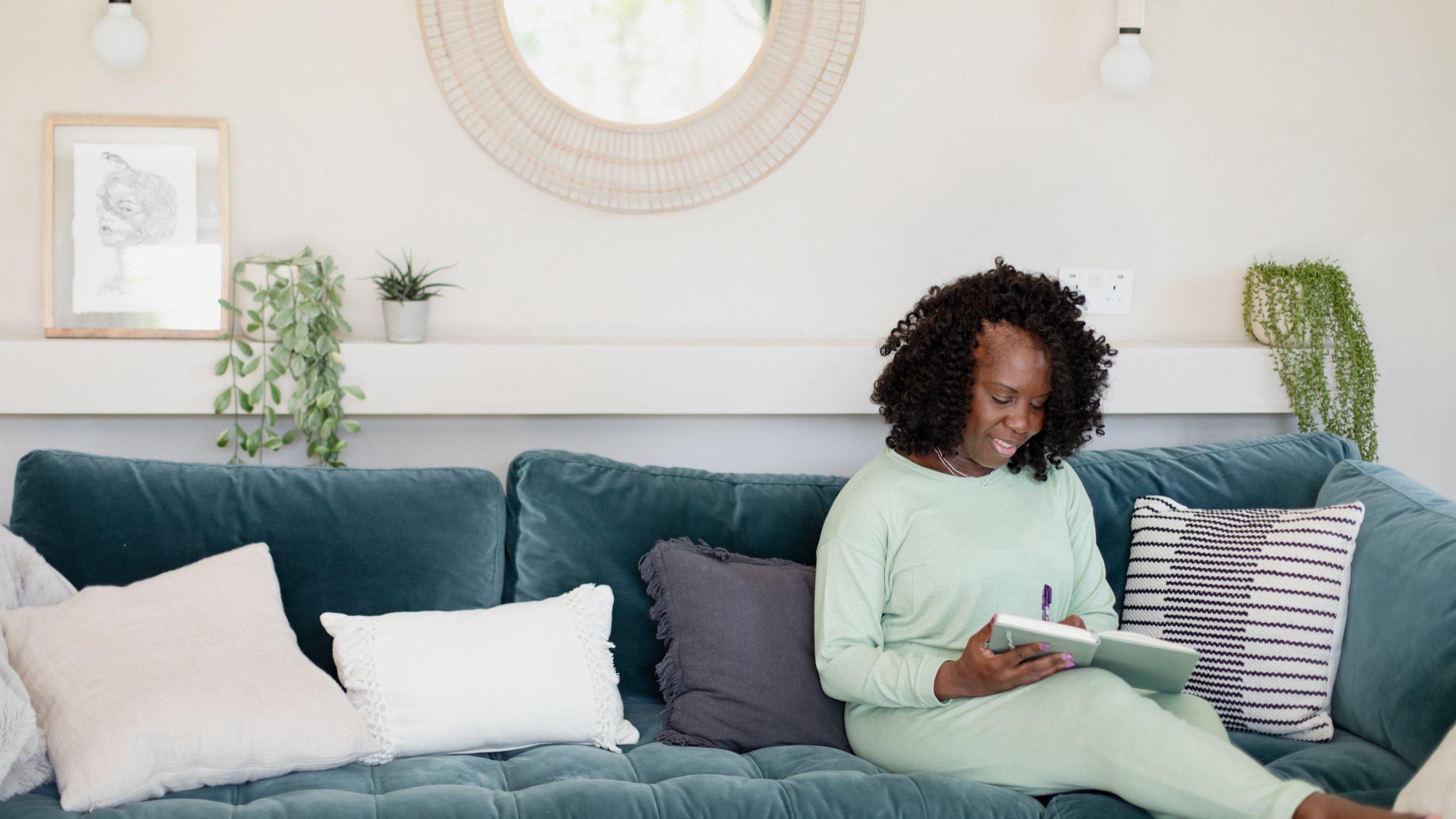 Eleshia sitting writing