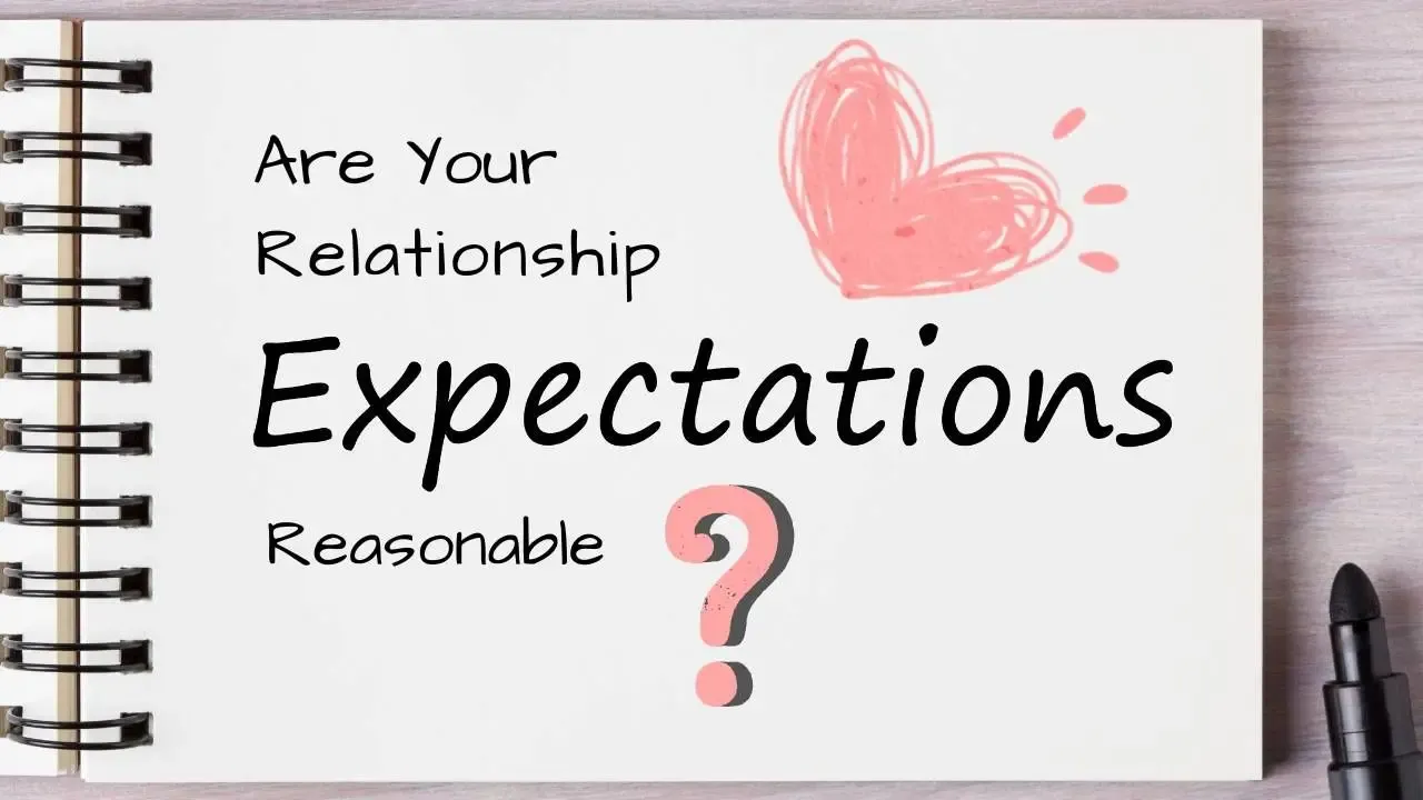 Question of healthy realistic expectations in a relationship with a heart written on notepad