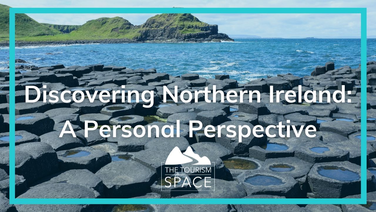 Discovering Northern Ireland A Personal Perspective The Tourism Space white logo | An image of the Giants Causeway in Co Antrim Northern Ireland.