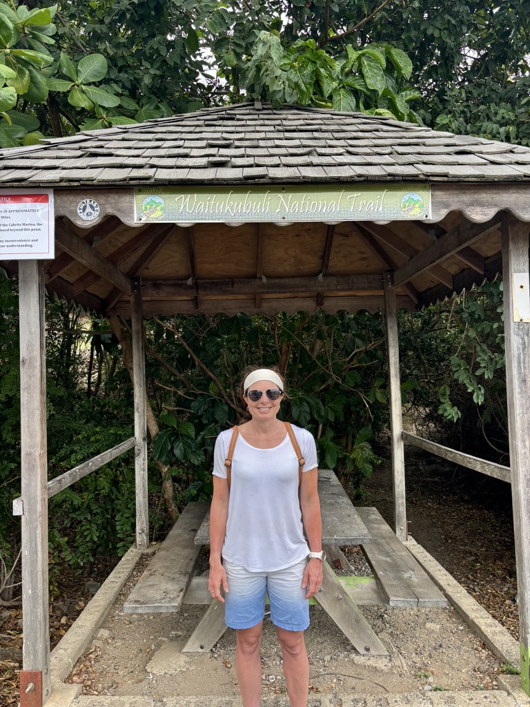 Mindy Gulas at the entrance to a hiking trail