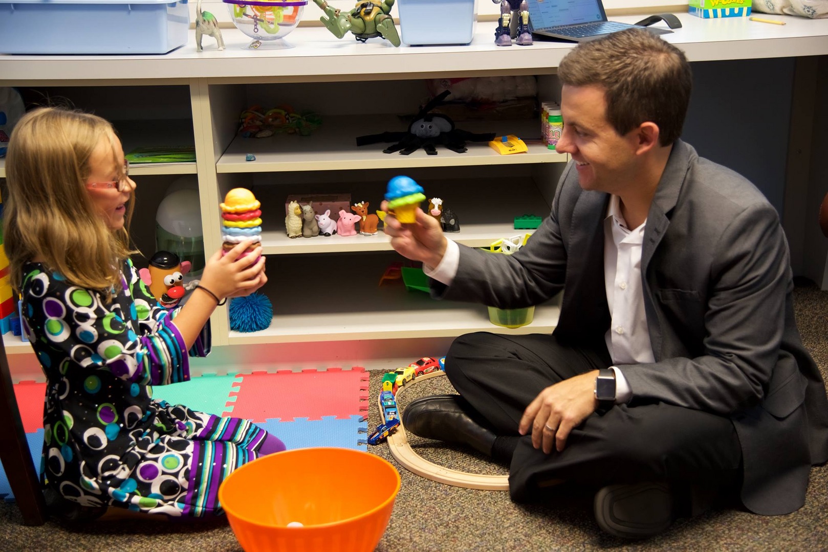 Dr. Bowers playing with a child