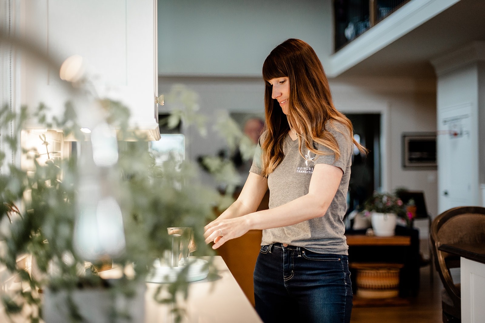 Unpacking and re-designing living spaces in downsized home in central Ohio