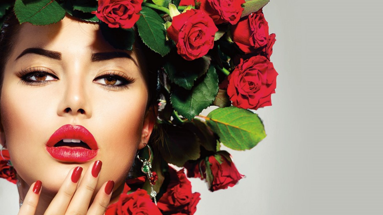 Fairytale Queen personality portrait featuring a confident bride with a crown of deep red roses, glamorous makeup, and regal styling that reflects elegance, confidence, and timeless bridal beauty.