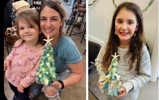 Child holding a sea glass tree at a kids party in Cleveland