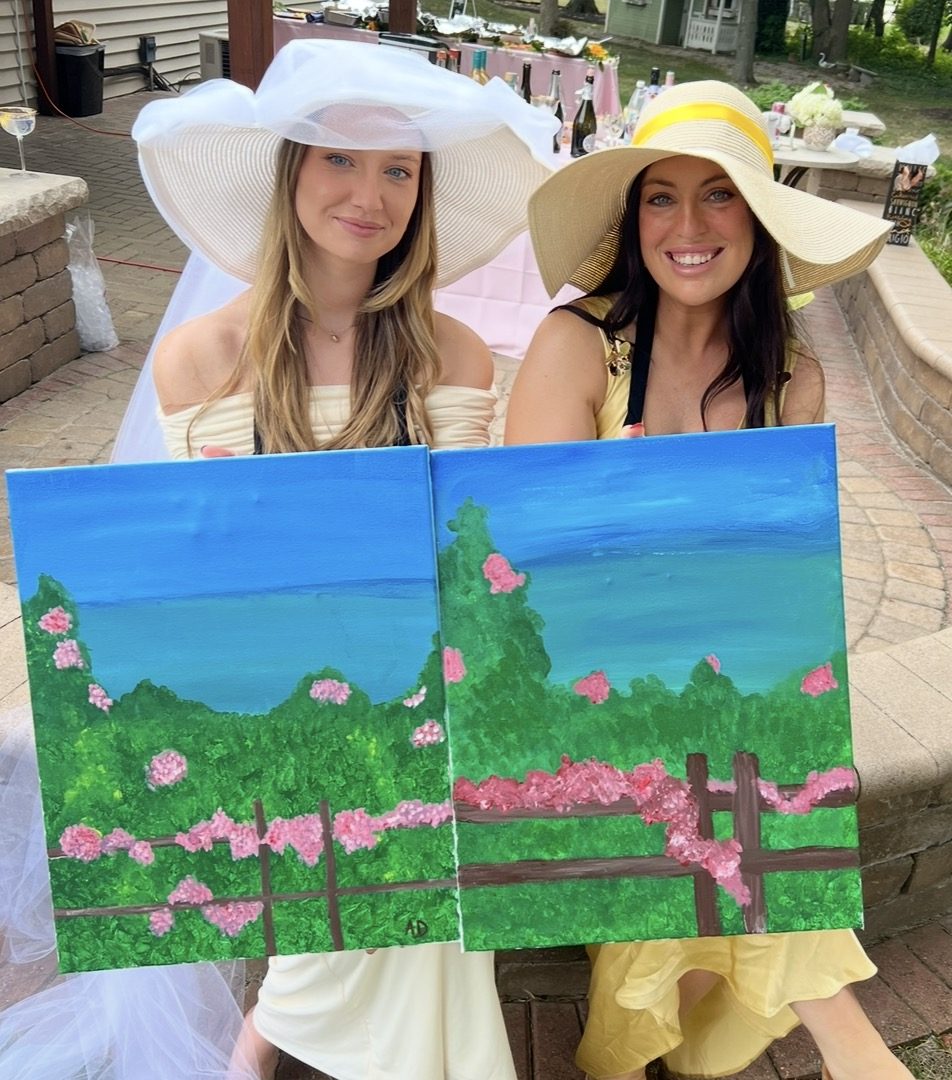 Guests at an Artist at Heart paint and sip party in Cleveland