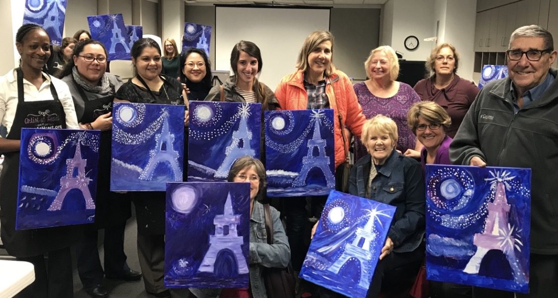 Guests at an Artist at Heart paint and sip party in Cleveland